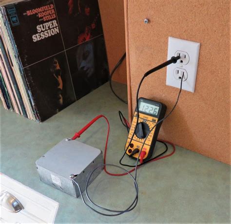 testing an electrified metal housing|How to tell if your electrical panel cover is energized.